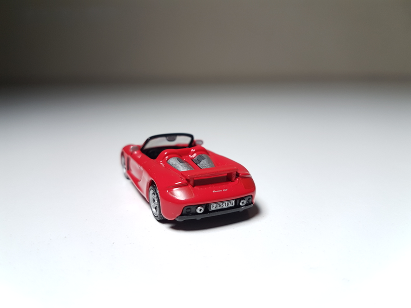 Illustration for article titled Makeitfit Monday: Rennsport Reunion Edition - Malibu International 1:87 Porsche Carrera GT